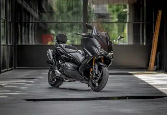 black sports bike on road during daytime